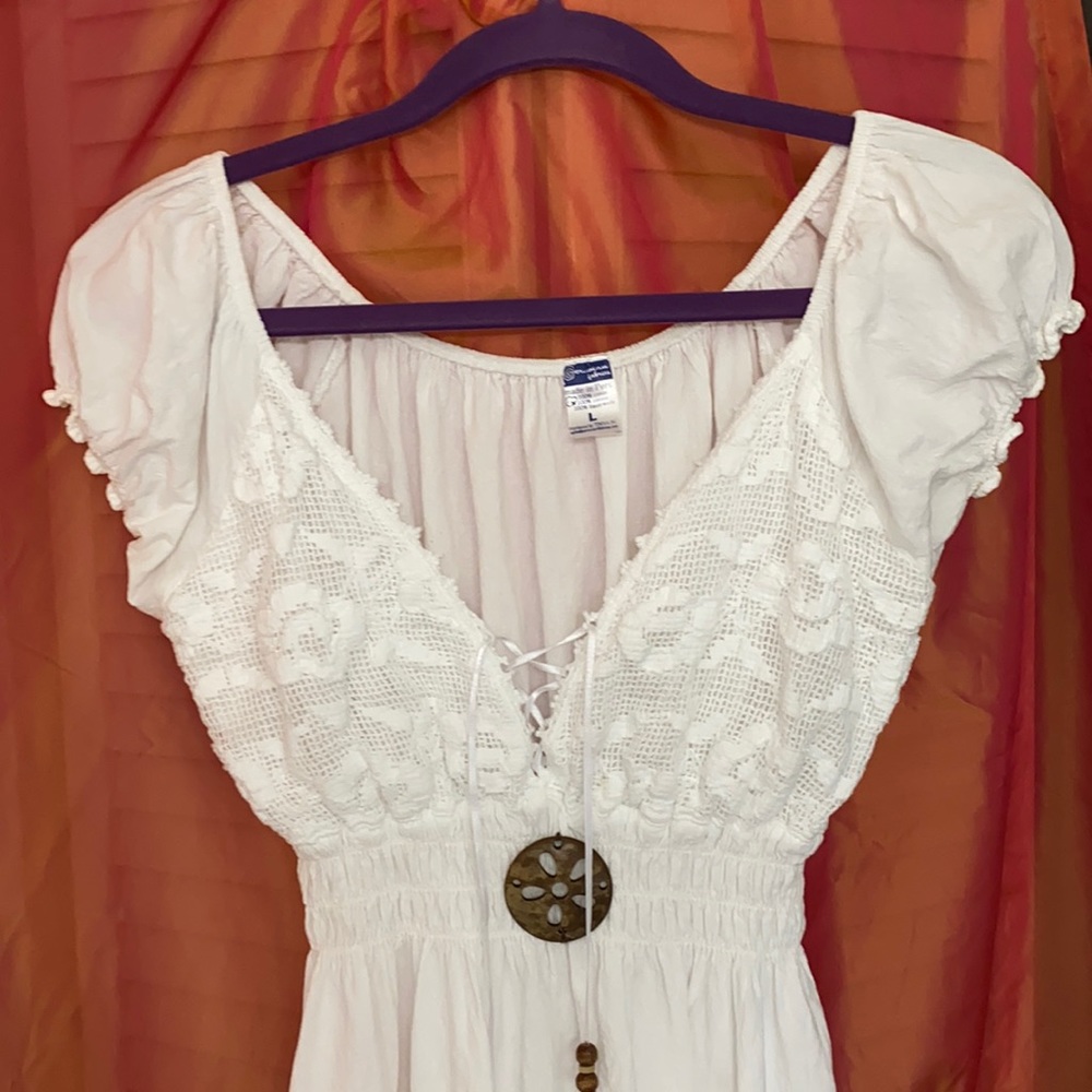 3/20 Beachy white top.